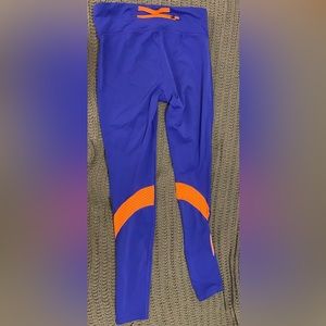 Under Armour purple and orange workout leggings